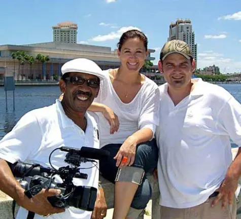 A group of people standing next to each other.