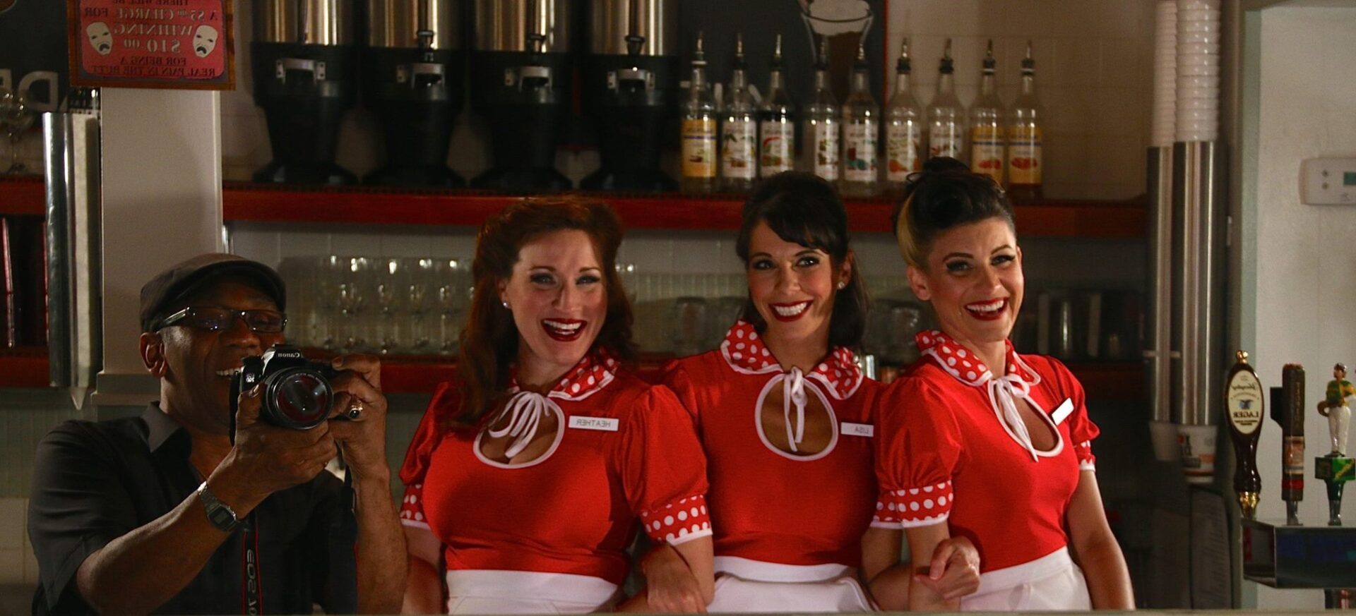 A group of women in red and white uniforms.